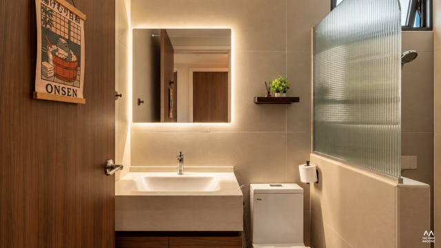 115 Compassvale 115 Compassvale HDB bathroom with a backlit mirror, minimalist vanity and warm lighting