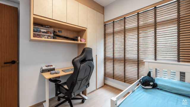 141A McNair 141A McNair HDB study area with a built-in desk, storage shelving and wood blinds