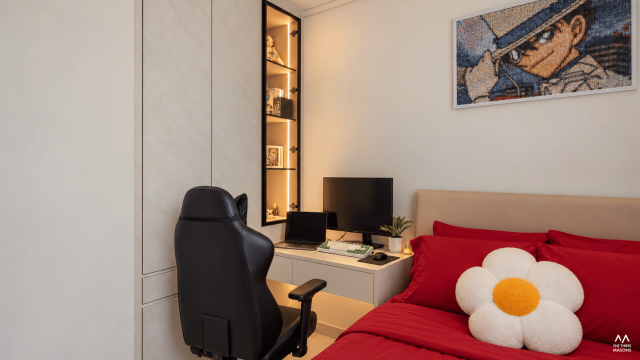 149 Woodlands 149 Woodlands HDB living room with a dark sofa, warm-toned finishes and a contemporary feature wall