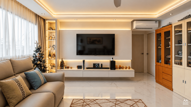 149 Woodlands 149 Woodlands HDB living room with a television feature wall, warm wood cabinetry and concealed lighting