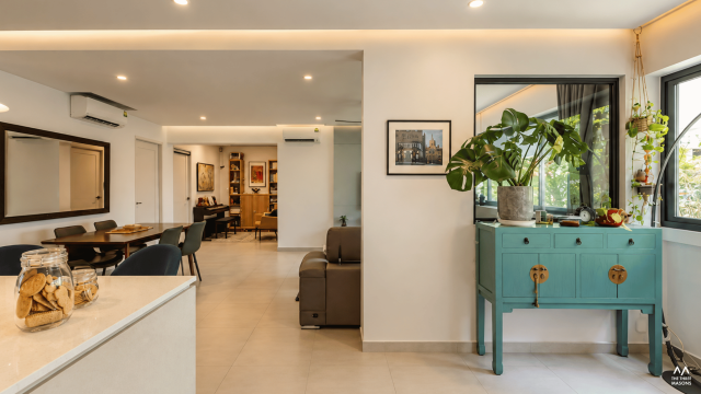 225 Kim Keat 225 Kim Keat HDB living and dining area with neutral finishes and indoor greenery