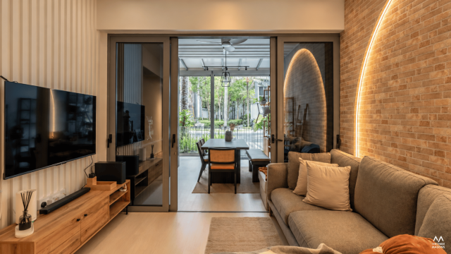 36 Fernvale 36 Fernvale HDB dining area with a wood dining table and a rounded feature opening