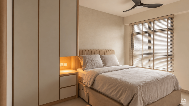 442A Northshore 442A Northshore HDB bedroom with a neutral upholstered bed and warm wood finishes