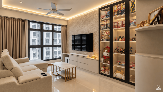 447A Punggol 447A Punggol HDB living room with a television feature wall, bookshelves and warm lighting