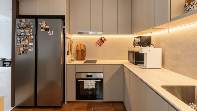 448B Punggol 448B Punggol HDB renovation featuring a beige kitchen with built-in cabinetry and warm lighting