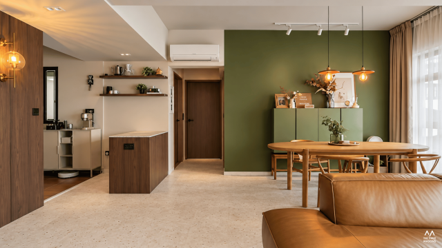 448B Punggol 448B Punggol HDB kitchen and dining area with light wood cabinetry and a green accent wall