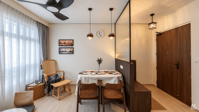 451A Bukit Batok 451A Bukit Batok HDB dining area with a wood dining table and warm pendant lighting