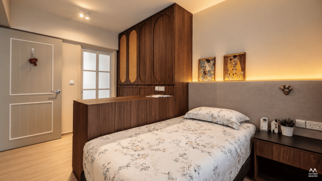 451A Bukit Batok 451A Bukit Batok HDB bedroom with warm wood cabinetry and a coordinated wood feature wall
