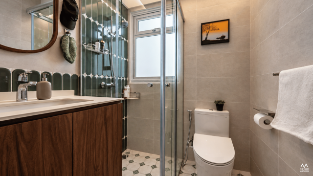 451A Bukit Batok 451A Bukit Batok HDB bathroom with a glass shower enclosure and grey tiled walls