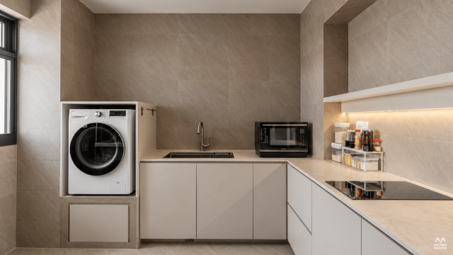 590B Pasir Ris 590B Pasir Ris HDB kitchen with light wood cabinetry and a built-in appliance area