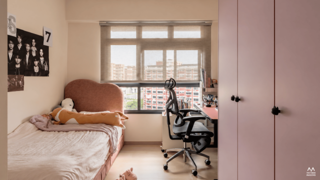 590B Pasir Ris 590B Pasir Ris HDB bedroom with a neutral upholstered bed and warm contemporary finishes