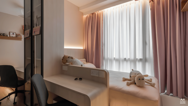65 Copen Grand 65 Copen Grand condominium bedroom with a neutral upholstered bed and soft curtains