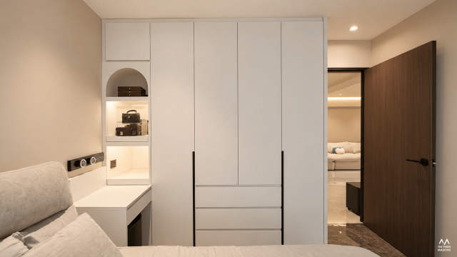 704 Choa Chu Kang 704 Choa Chu Kang HDB interior with light cabinetry and a minimalist built-in storage design