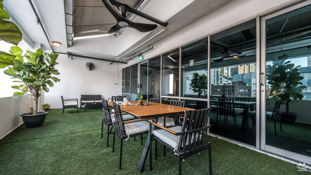 Dandelion Studios Dandelion Studios workspace with an industrial ceiling, glass partitions and office furniture
