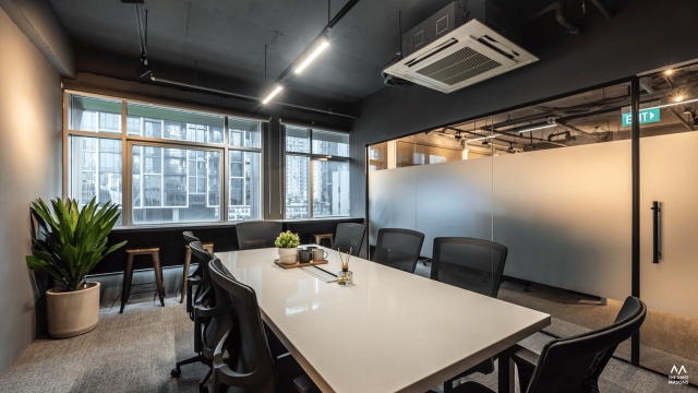 Dandelion Studios Dandelion Studios workspace with open desks, glass partitions and exposed ceiling services
